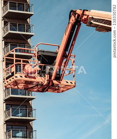 Basket lift on construction site Basket lift on construction site 138330782