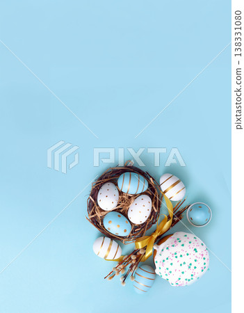 Easter egg and cake on grey table background. Easter egg and cake on grey table background. 138331080