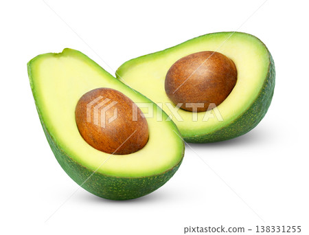Two halves of avocado isolated. Half of avocado with seed with clipping path. 138331255