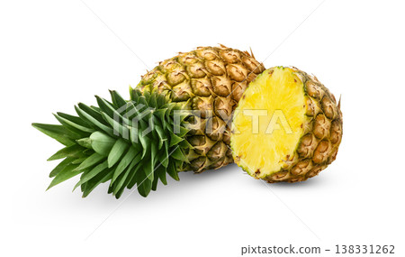 Whole laying pineapple fruit and cut in a half of pineapple isolated. Whole laying pineapple fruit and cut in a half of pineapple isolated. 138331262