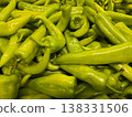 Top view of fresh organic long green chili peppers background pattern at farmers market 138331506