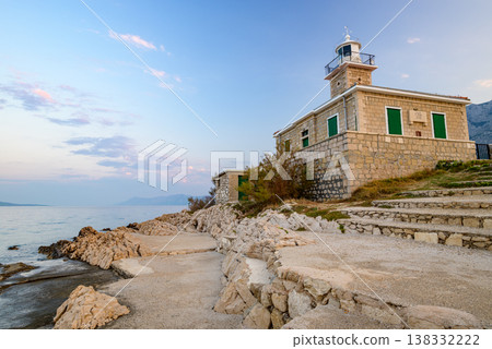 Stone St. Peter lighthouse on Adriatic sea in Makarska riviera in Croatia Stone St. Peter lighthouse on Adriatic sea in Makarska riviera in Croatia 138332222