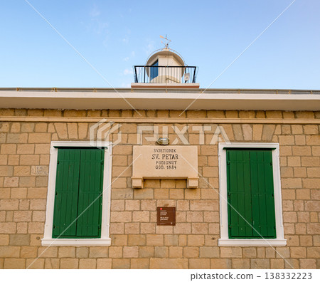 Stone St. Peter lighthouse on Adriatic sea in Makarska riviera in Croatia 138332223