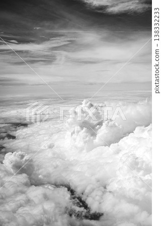 Black and white aerial view above clouds Black and white aerial view above clouds 138332233