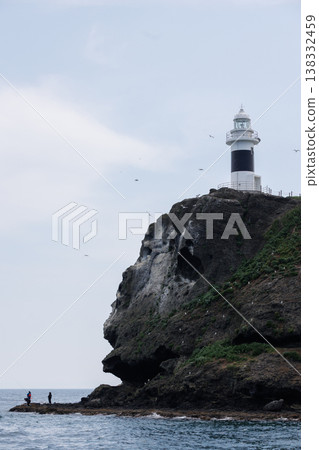 Taijima Island and anglers (Mutsu Bay, Aomori Prefecture) Taijima Island and anglers (Mutsu Bay, Aomori Prefecture) 138332459