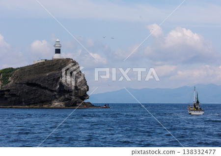 The tip of Taijima Island and fishing boats in early summer, as seen from the sea (Mutsu Bay, Aomori Prefecture) The tip of Taijima Island and fishing boats in early summer, as seen from the sea (Mutsu Bay, Aomori Prefecture) 138332477