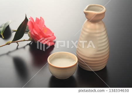 Japanese sake and snow camellia Japanese sake and snow camellia 138334630