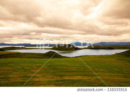 Sunset over Lake Mývatn, a volcanic lake in northern Iceland, a Nordic island nation, also known for its false crater. 138335918