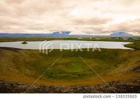 Sunset over Lake Mývatn, a volcanic lake in northern Iceland, a Nordic island nation, also known for its false crater. Sunset over Lake Mývatn, a volcanic lake in northern Iceland, a Nordic island nation, also known for its false crater. 138335920