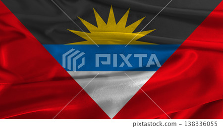 Flag of Antigua and Barbuda with fabric textured background. Close up of National flag of Antigua and Barbuda with realistic texture 138336055