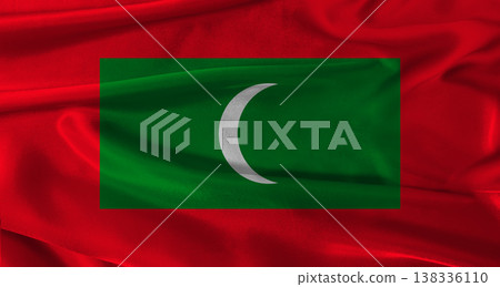 Flag of Maldives with fabric textured background. Close up of National flag of Maldives with realistic texture 138336110
