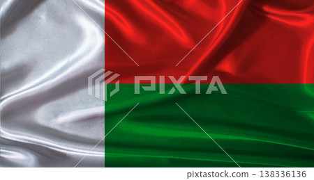National flag of Madagascar with cloth texture. Madagascar flag with realistic texture background National flag of Madagascar with cloth texture. Madagascar flag with realistic texture background 138336136