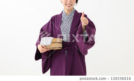 A woman smiling in a yukata A woman smiling in a yukata 138336818