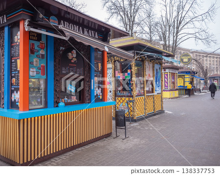 [Ukraine] A coffee stand operating on a street corner in Kyiv, the capital, and the historic streetscape. 138337753