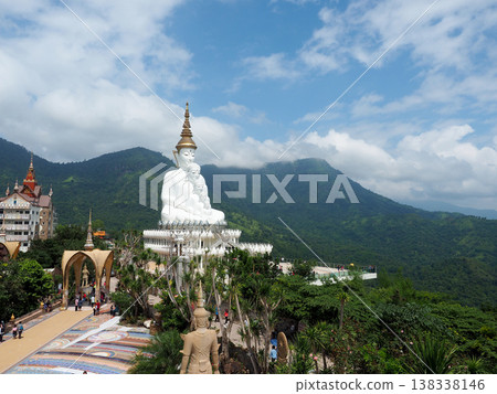 Oct 21 2016, Phetchboon Thailand, White statue temple mountain, green valley, blue sky scene 138338146
