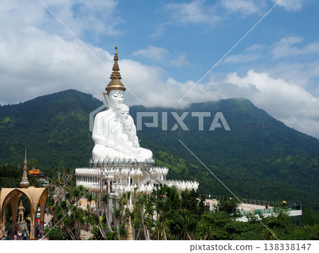 Oct 21 2016, Phetchboon Thailand, White buddha statue mountain temple religion travel peaceful scene under blue sky Oct 21 2016, Phetchboon Thailand, White buddha statue mountain temple religion travel peaceful scene under blue sky 138338147