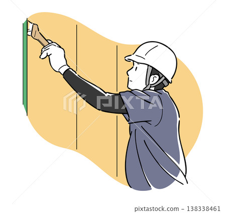 一名男工人在用畫筆作畫；手繪。 138338461