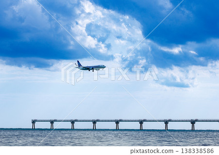 View of planes landing at Naha Airport from Senaga Island View of planes landing at Naha Airport from Senaga Island 138338586