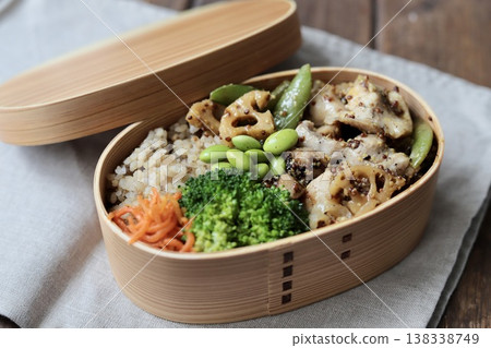 A healthy bento box with mustard chicken and plenty of vegetables, under 500 calories. A healthy bento box with mustard chicken and plenty of vegetables, under 500 calories. 138338749