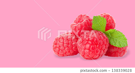 Bunch of fresh raspberries with green leaves on pink surface 138339028