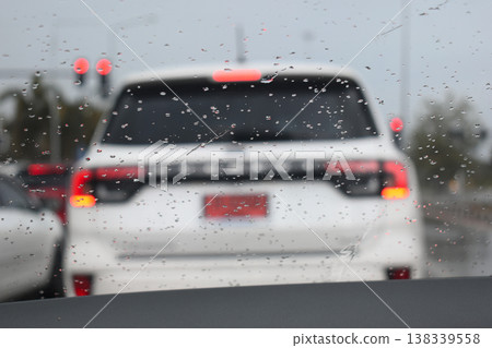 car on highway road with rainny season, blurred image car on highway road with rainny season, blurred image 138339558