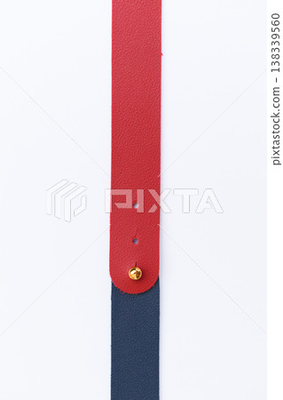 dark blue and red leather strap isolated on white background 138339560