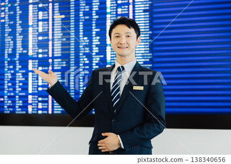 Male airport ground staff providing guidance. (Photography courtesy of Kansai International Airport (KIX)) 138340656