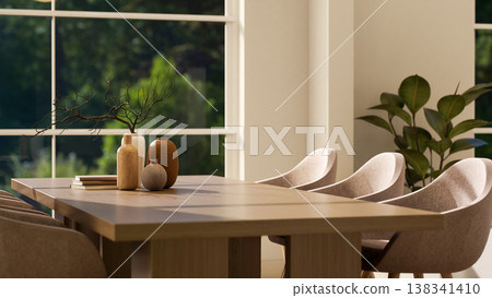Book an vase on wooden table and curved chairs aside glass wall window in cosy dining or living room Book an vase on wooden table and curved chairs aside glass wall window in cosy dining or living room 138341410