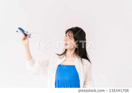 woman travel airplane woman travel airplane 138341706