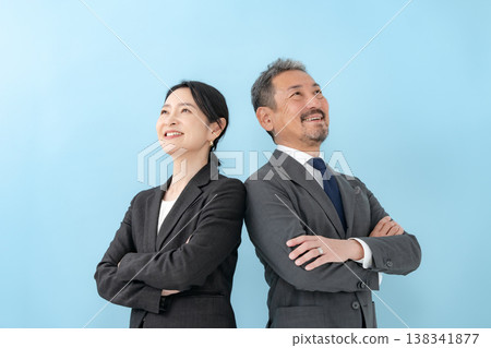 Business men and women arms crossed 138341877