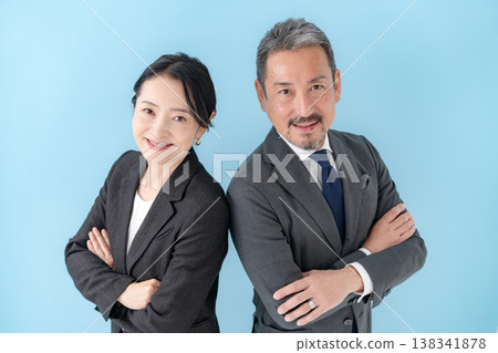 Business men and women arms crossed 138341878