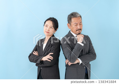 Business men and women worry 138341884