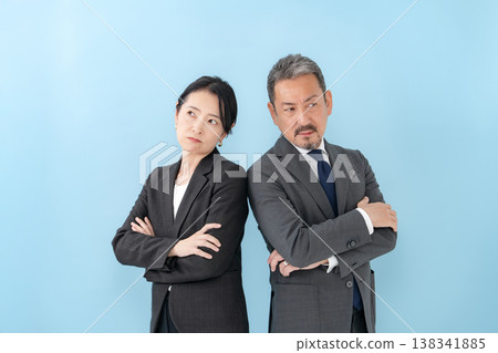 Business men and women worry 138341885