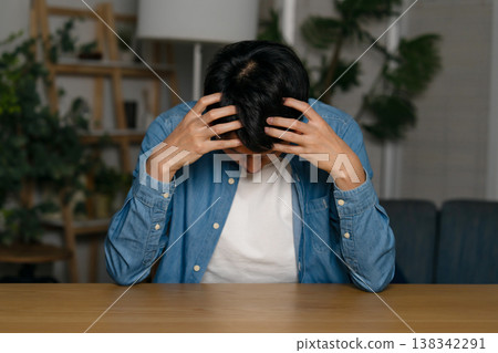 Male, troubled, despairing, casual Male, troubled, despairing, casual 138342291