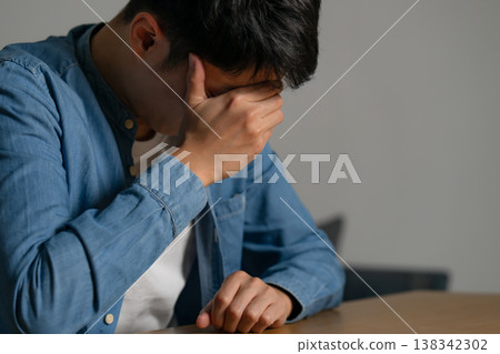 Male, troubled, despairing, casual 138342302