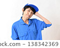 A middle-aged Asian female worker in distress 138342369