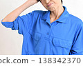 A middle-aged Asian female worker in distress 138342370