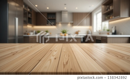 Close-up of a light wooden tabletop with a blurred background of a modern, clean kitchen featuring warm lighting and minimalist decor. Close-up of a light wooden tabletop with a blurred background of a modern, clean kitchen featuring warm lighting and minimalist decor. 138342892