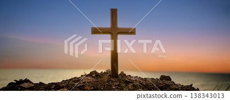 The cross standing on meadow sunset and bokeh background. 138343013