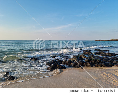 This is Gwakji Beach in Jeju Island, which has basalt rocks. 138343101