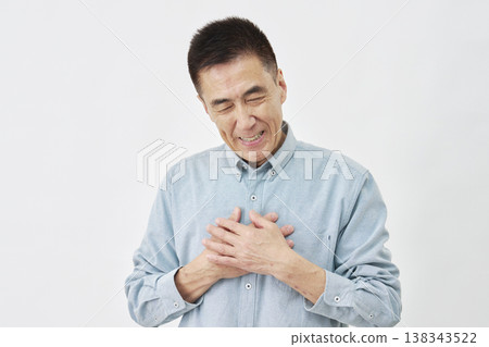 A man feeling relieved on a white background A man feeling relieved on a white background 138343522