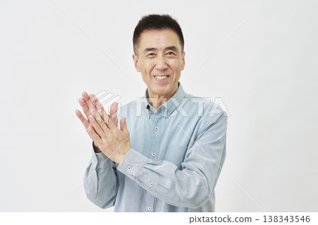 Man clapping on white background 138343546
