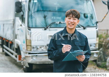 Truck driver with binder Truck driver with binder 138344758