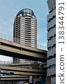 Multiple layers of elevated bridges and modern skyscrapers 138344791