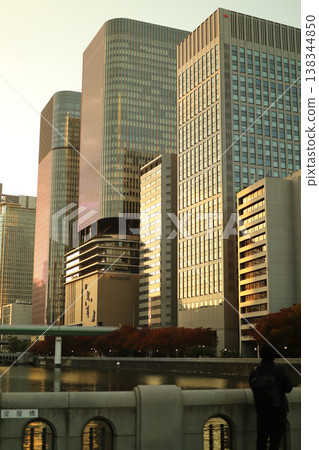 City skyline photo of skyscrapers and sunset 138344850