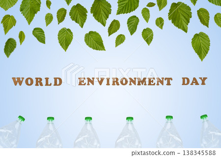 Beat plastic pollution. World Environment day concept. Happy Environment day, 05 June. Green leaves and plastic bottle and green leaves on a blue background. Ecology concept. 138345588
