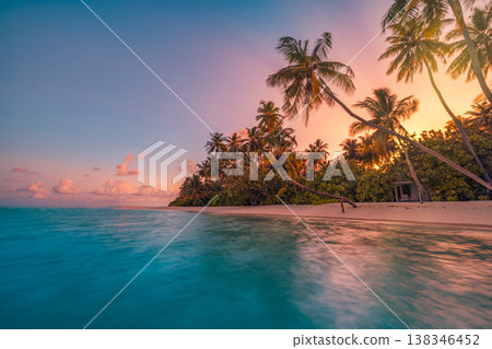 Perfect tropical sunset beach with exotic ocean shore, relaxing tranquil summer vacation wallpaper, breathtaking sunlight and nature outdoors 138346452