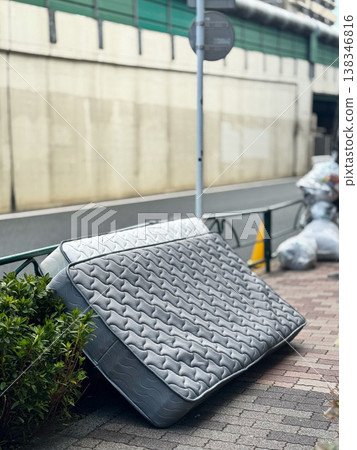 Abandoned mattress - bulky waste Abandoned mattress - bulky waste 138346816