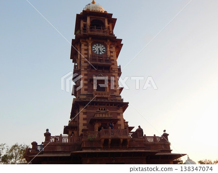 Historic Ghanta Ghar clock tower in Jodhpur, Rajasthan, beautifully silhouetted against a clear twilight sky. 138347074