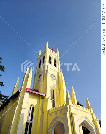 Front perspective of Christ Church Shimla illuminated by sunlight, with sharp architectural lines and a deep blue sky, emphasizing the landmarks prominence in the town center. Front perspective of Christ Church Shimla illuminated by sunlight, with sharp architectural lines and a deep blue sky, emphasizing the landmarks prominence in the town center. 138347100
